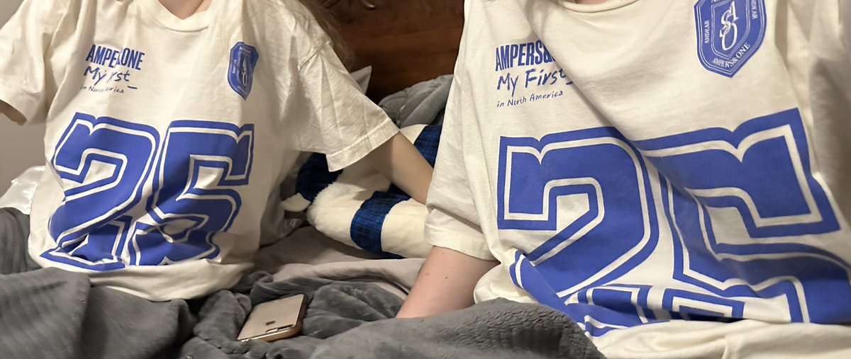 heartlikecal's tweet photo. first in our bloodlines to put on our ampers&amp;one fan concert merch to watch them perform half of broken heart in phoenix arizona airplayed from weverse to the tv https://t.co/hEpa9svUxM