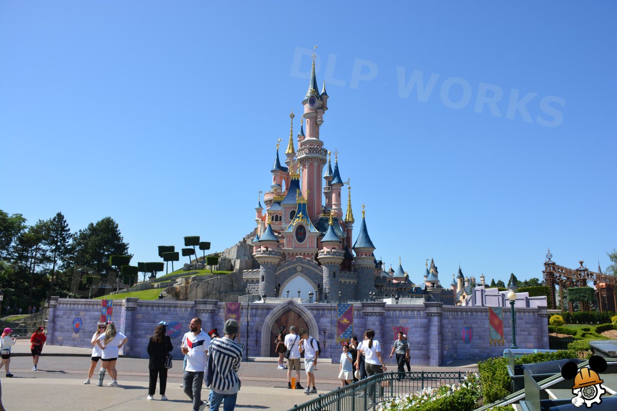 DLPWorks's tweet photo. [Analysis] 🚧 Update on Sleeping Beauty Castle Bridge Refurbishment!

➡️ Behind the tarps displaying the Castle's design, work continues with the removal of the bridge's decking!
➡️ Fountains & other technical elements will remain deactivated during the project, currently scheduled to continue until September at #DisneylandParis.