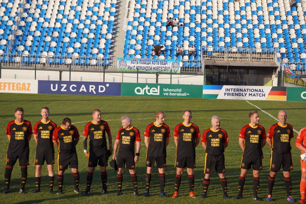 ChollimaOrg's tweet photo. Loving the shirts! #YoungPioneerTours sponsored the #GermanAllStars to play in Central Asia. Lost 5-2, but a great day out. https://t.co/Iu6xKT0tJ0
