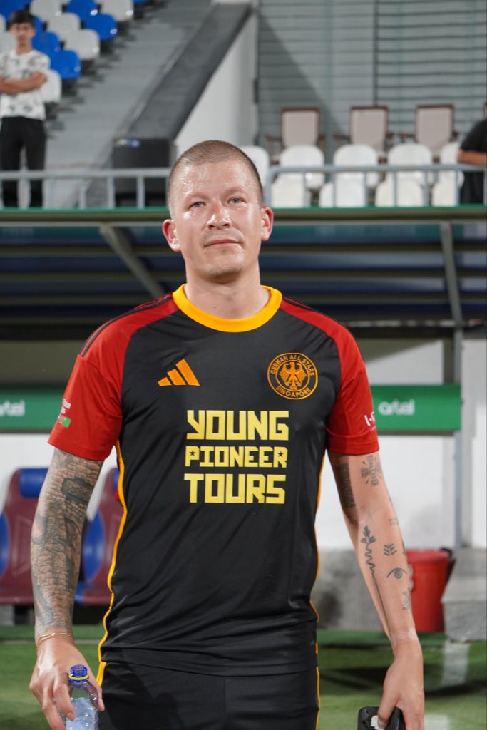 ChollimaOrg's tweet photo. Loving the shirts! #YoungPioneerTours sponsored the #GermanAllStars to play in Central Asia. Lost 5-2, but a great day out. https://t.co/Iu6xKT0tJ0
