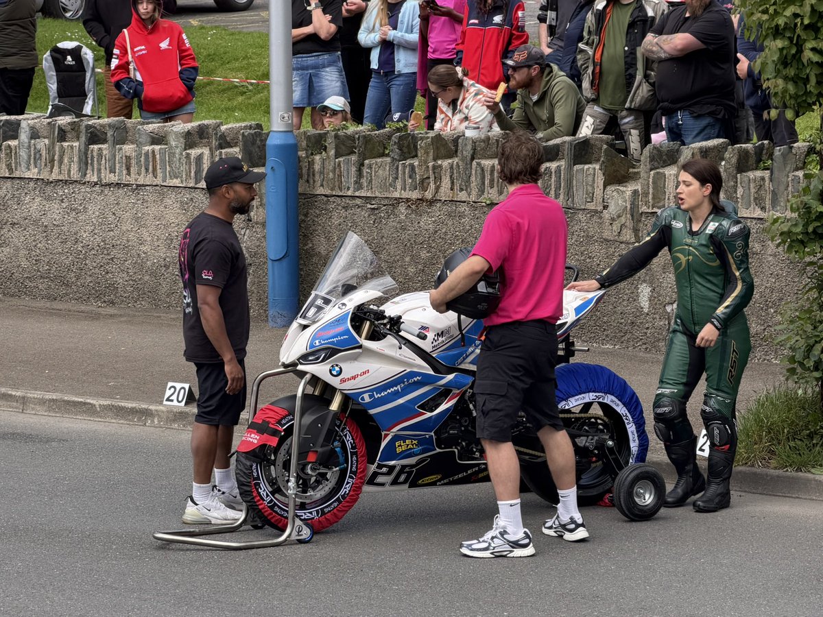 Amadeus_IOM's tweet photo. No you’re not seeing double. There are really two version of Eve Hewson on this he set, one being her stunt double. Filming just now for the Isle of Man TT movie. #iomtt  #Isleofman #TT2026 #isleofmantt https://t.co/t8oVMXarjK