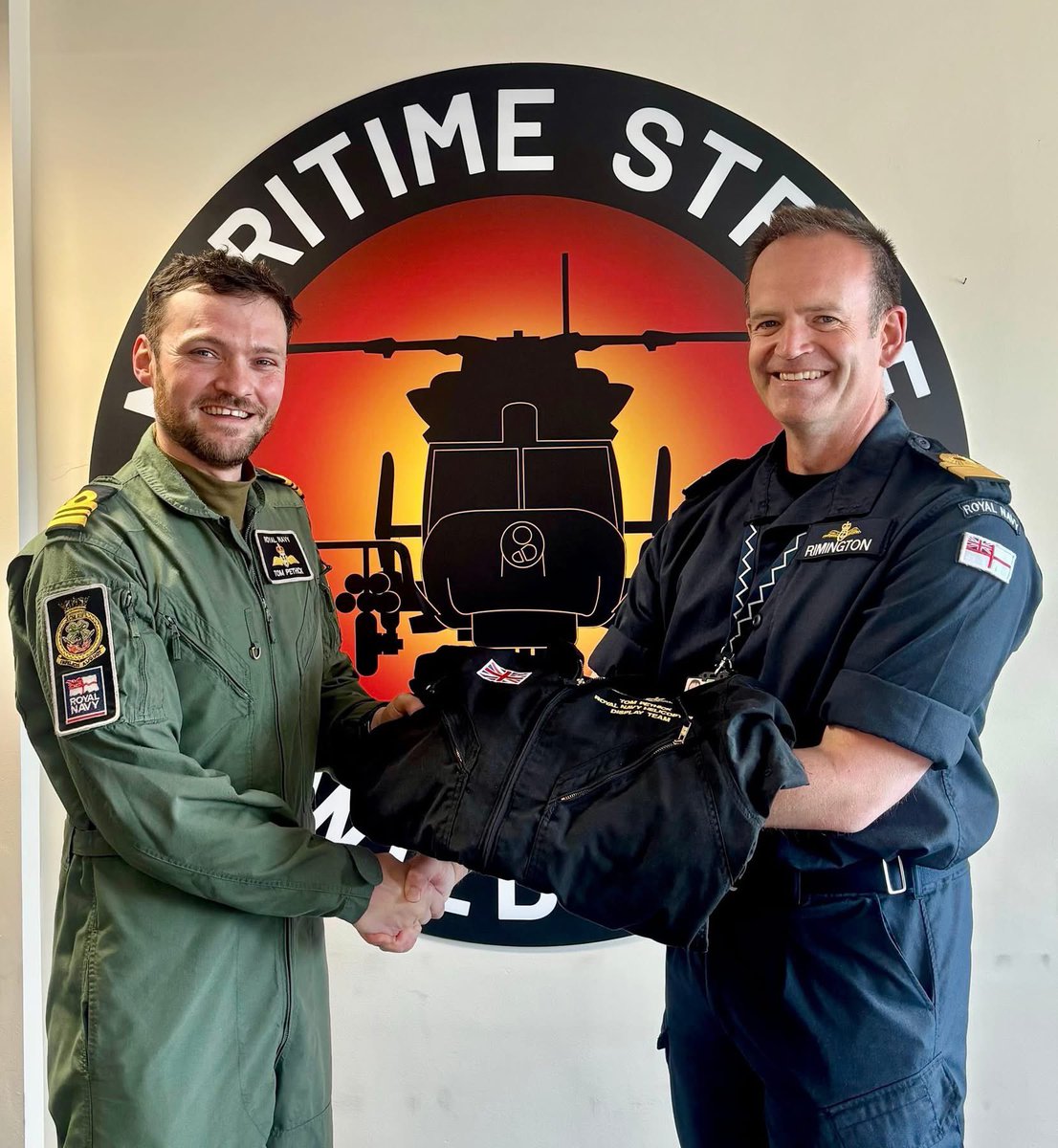 RNASYeovilton's tweet photo. Black Cats pilots Lt Cdr Jim
And Lt Cdr Tom receive the seal of approval and presented with coveted Black Cat overall https://t.co/E0dV1IbSgx
