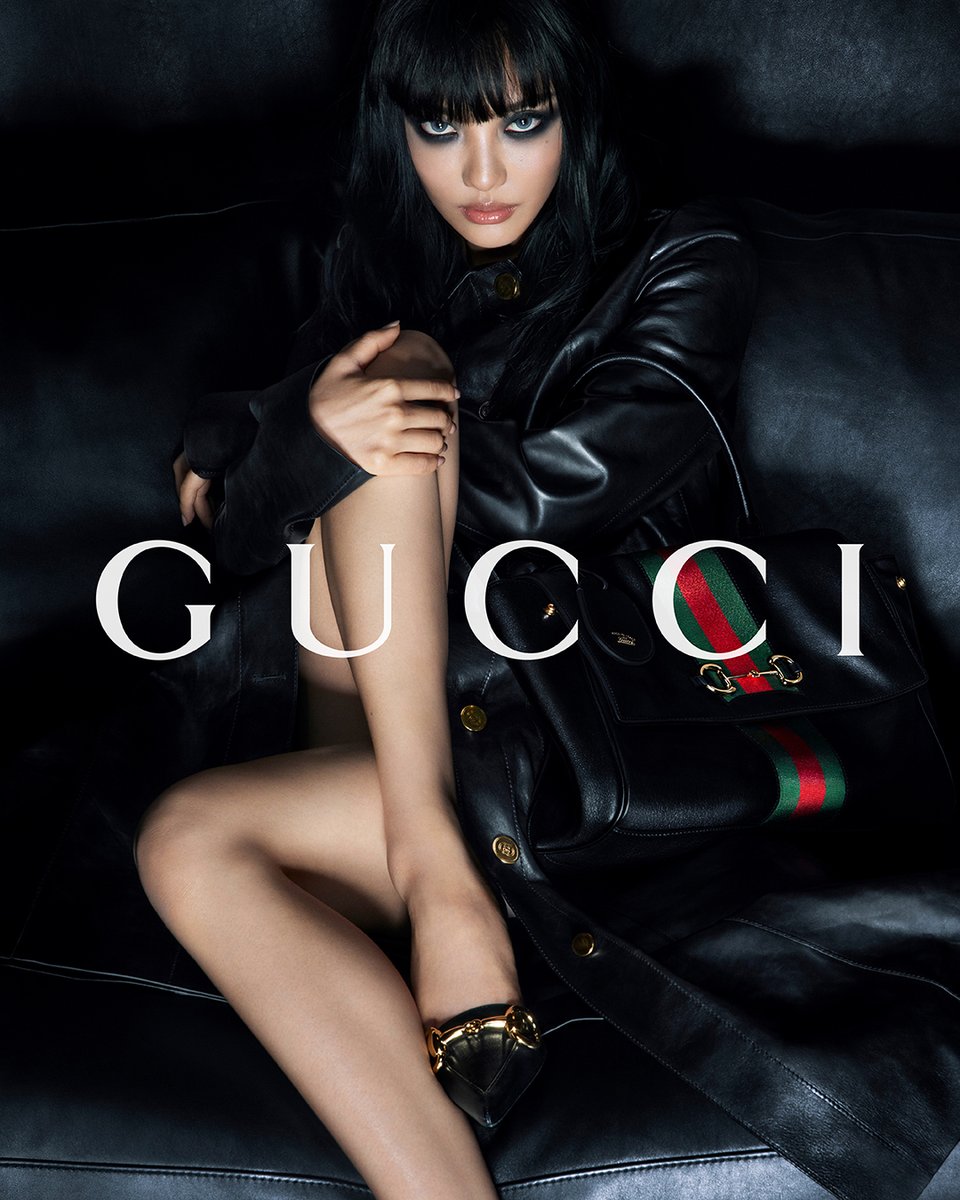 gucci's tweet photo. BEAUTY AND THE BAG 
 
The next chapter of the campaign continues with Global Brand Ambassador #NINGNING from @aespa_official and the new #GucciPaparazzo handbag, captured by Mert and Marcus.  
 
Discover more https://t.co/T3CFJz5um1 
 
#aespa https://t.co/F0rGM8V05W