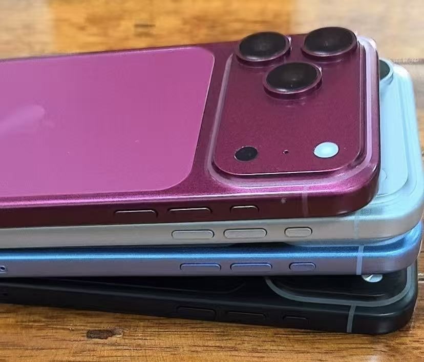 SonnyDickson's tweet photo. First look at iPhone 18 dummies in the new colors: Black, Silver, Dark Cherry and Light Blue. Cherry will probably be the next hit, orange did very well. https://t.co/2qpZDA7oEK