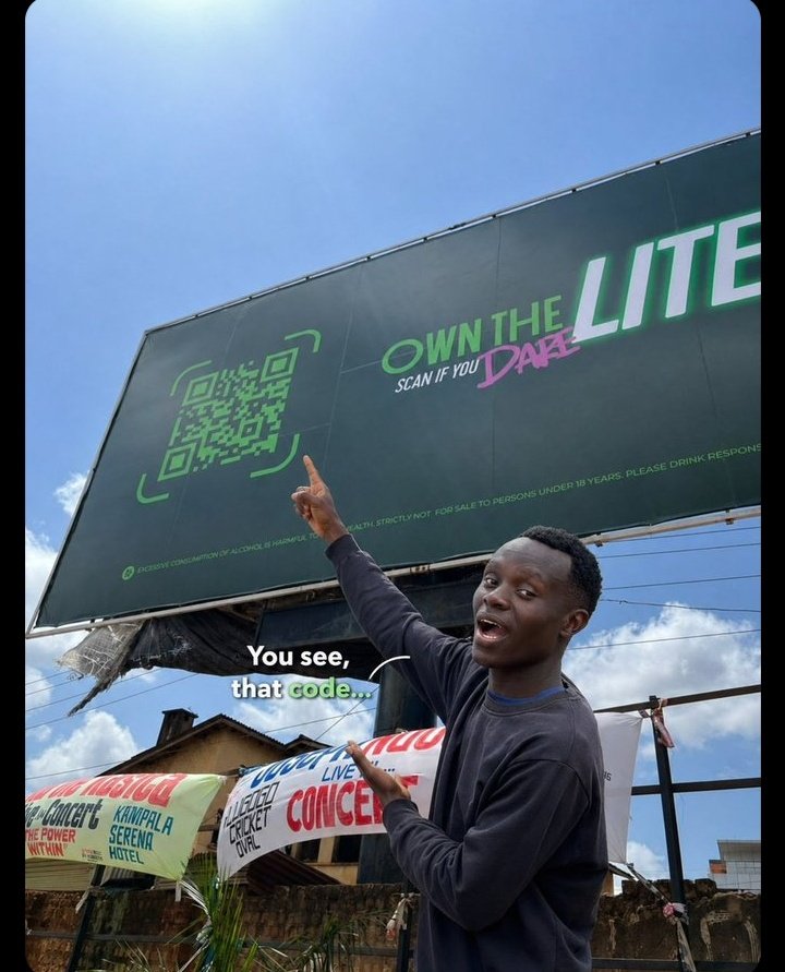 Ashburg82's tweet photo. So you’re telling me I can just scan the #OwnTheLite billboard in Kampala… and suddenly become the celebrity on the billboard?
Kampala streets will never see peace again 🏃‍♂️🏃‍♂️
At this point, even traffic officers will understand… https://t.co/bBv7f2jVyq