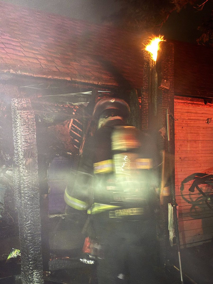 Denver_Fire's tweet photo. 5000 Block of Washington St. A detached garage and fence fire. Looks like it went from an outside fire into the garage. No injuries. No damage to other structures. https://t.co/WvCTm17p9q