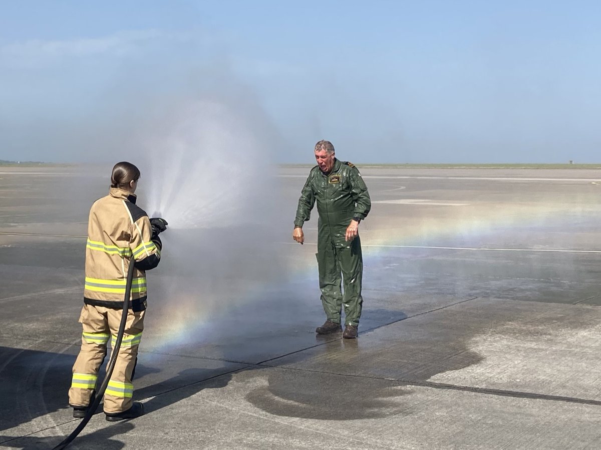 RNASCuldrose's tweet photo. Having achieved 6,000 flying hours, over 34 years' service, @RoyalNavy Merlin helicopter pilot Lt Cdr Steve Thomas was treated to an affectionate soaking, courtesy of the Culdrose fire crew (he actually dared them to do it) as he returned to #824NAS yesterday afternoon. #BZ Steve https://t.co/CRJ3DWIcwY