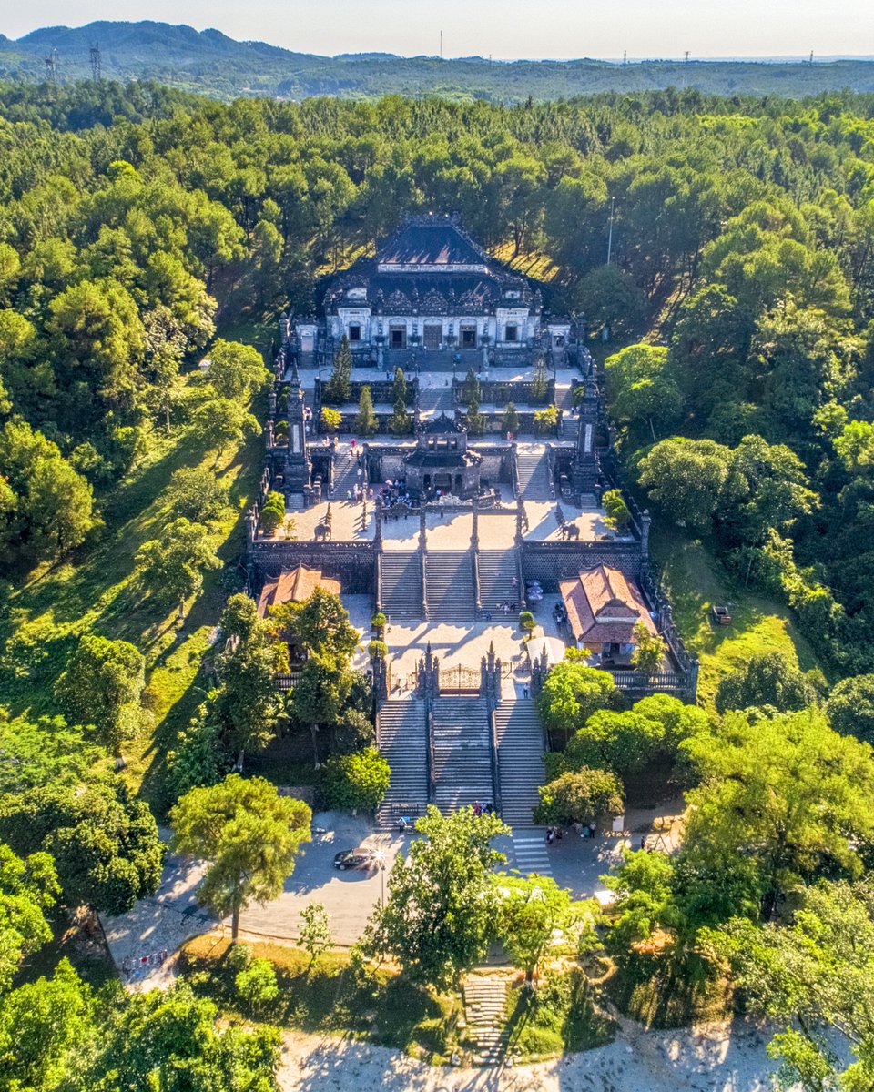 LocDang4's tweet photo. This breathtaking aerial photograph immediately creates a sense of grandeur and mystery. Nestled deep within endless greenery, the ancient structure appears almost protected by the forest itself. https://t.co/5FH00i43aW https://t.co/M5InTiZc0I