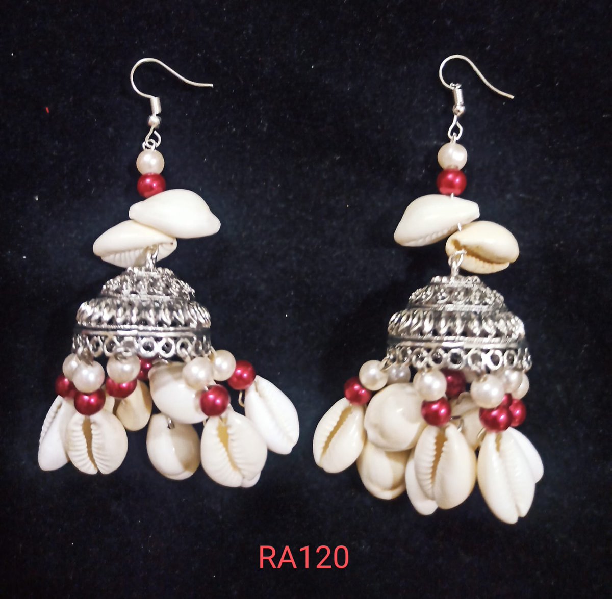 Zivvo82's tweet photo. Tradition vs. trend: Which festive earrings will you choose?

The Golden Leaf Jhumkas offer tradition with delicate leaf motifs and pearl accents.

The Neon Fabric Studs are modern art you can wear, bright lime-green fabric with metallic sun-discs. https://t.co/1eDbiC0XSe