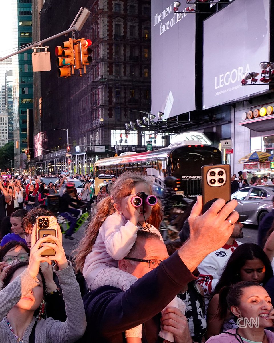 CNNweather's tweet photo. New Yorkers gathered on 42nd Street near Times Square to see the “Manhattanhenge” solar spectacle on Thursday May 28.

It’s a phenomenon where the sun perfectly aligns with Manhattan’s street grid, allowing it to be seen directly between the city’s skyscrapers.

📍 For the best effect, position yourself as far east in Manhattan as possible. Be sure that when you look west across the avenues, you can still see New Jersey. Here are some particularly good ones:
- 14th Street
- 23rd Street
- 34th Street
- 42nd Street
- 57th Street

📸: Getty Images