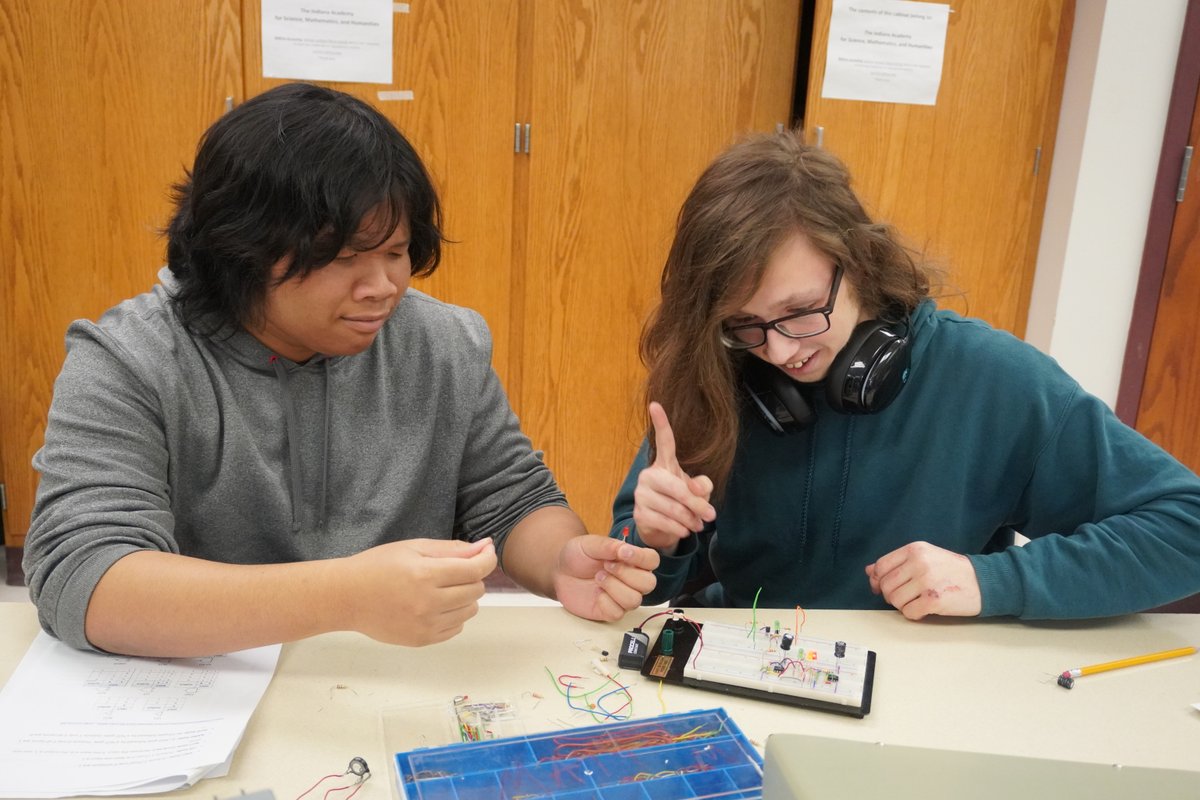 IndianaAcademy's tweet photo. Dr. Godfrey Walwema's May Term class, Digital Electronics, received hands-on experience by learning to construct electronic units for different detectors, investigate relationships between frequencies, and study electrical signals using a Cathode Ray Oscilloscope. https://t.co/Rkl1INXnxI