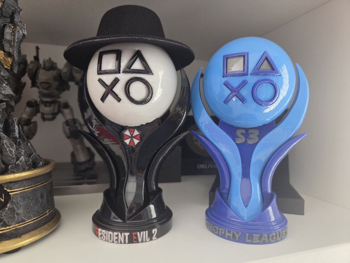 _V1ad_K's tweet photo. After a while I've received 2 great trophies-figurines.
These trophies were created by @GrimsPlatDesign.
Won it by participating in @pstrophyleagues and winning a thematic round (dedicated to RE) and achieving 1st place in one of the League Tables.

Awesome addition to collection https://t.co/BhoVXCVGpQ