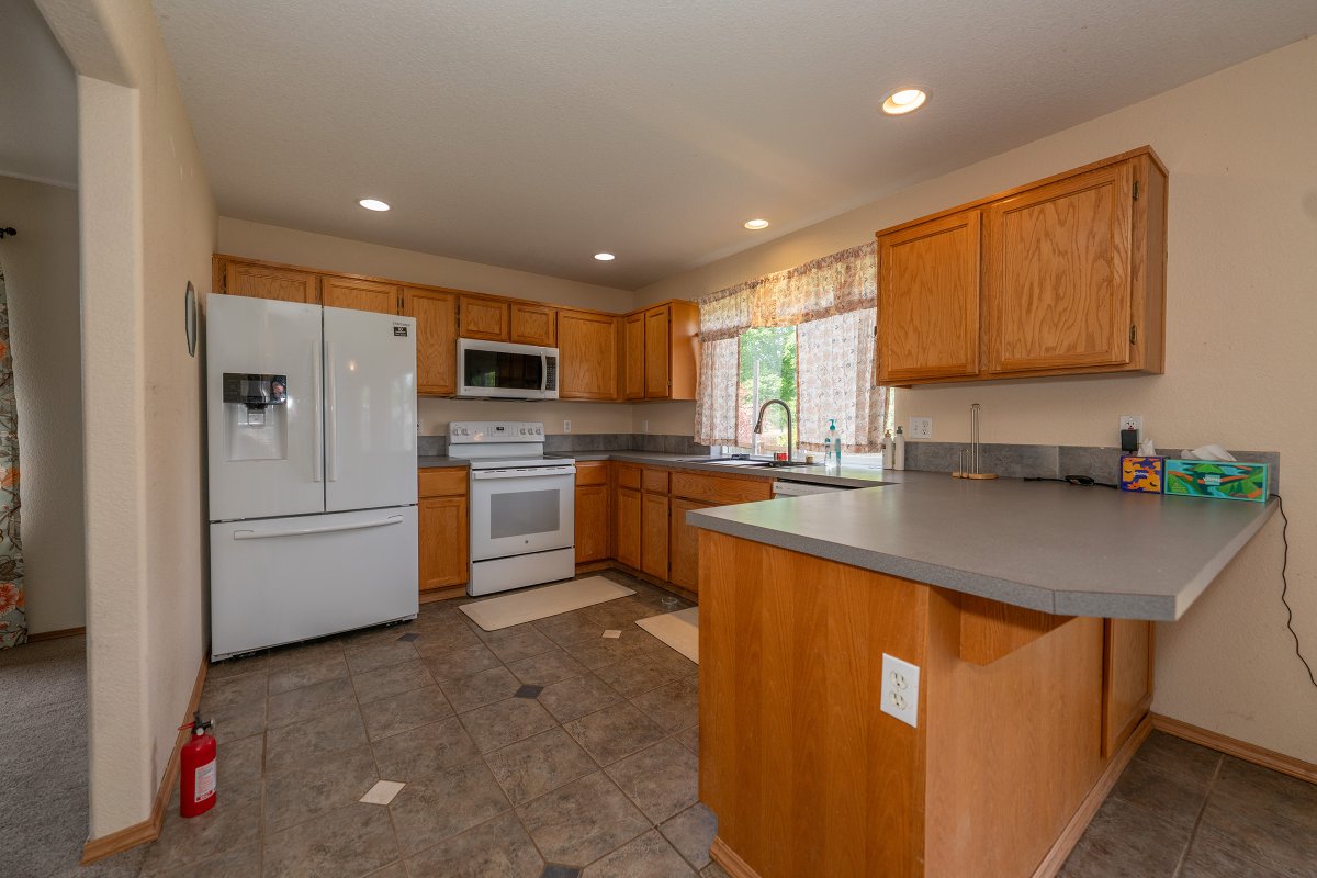 RealEstateYelm's tweet photo. Marketing Remarks:
Rare golf course opportunity! Enjoy a panoramic view from the 6th Tee Box of the Tahoma Valley Golf Course from this 4 Bedroom 2.5 Bathroom, 2,041 SqFt home with Central Air Conditioning and 2 car garage.

As you enter the home, you’ll find a nice living room and dining room. Past that is the kitchen with eating space that features Oak Cabinets, white appliances and a great multi-function Kichae sink. Along the back of the home is a dining nook with beautiful ceramic tile floor and a large family room with a gas fireplace. There’s also a centrally located half-bath on the main floor.

Upstairs, you'll find a Primary Bedroom with walk-in closet, full bath with separate tub and shower as well as a double-sink vanity. Add to that 3 more comfortable-sized bedrooms (one with walk-in closet), the Laundry Room, and full-bathroom and you have a very nicely arranged home.

The fully-fenced backyard features a concrete patio, large storage shed and plenty of room to play!

Conveniently located near schools, shopping, dining, and JBLM access, this home combines comfort, space, and an exceptional golf course view!

Address:
15301 105th Ave SE
Yelm, WA 98597

Asking Price:
$515,000

Call Bill Sauneuf of John L. Scott Real Estate / Yelm at 360-708-2929 for more information or to schedule a tour of this great home!
