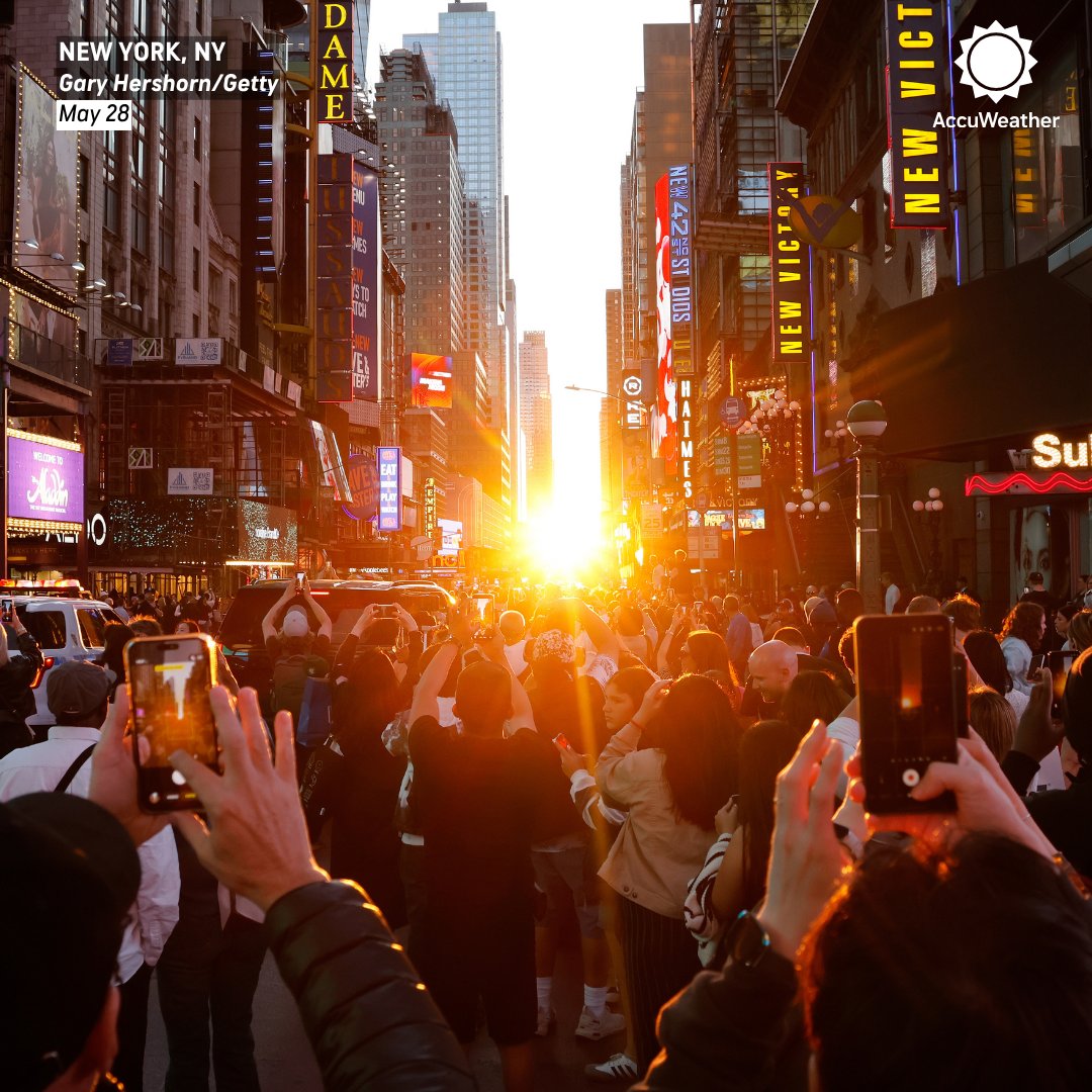 accuweather's tweet photo. Crowds gathered in New York City last night to witness Manhattanhenge, the twice-yearly phenomenon when the setting sun perfectly aligns with Manhattan’s street grid and shines between the city’s skyscrapers 🌇 https://t.co/4sd5xeSrLt