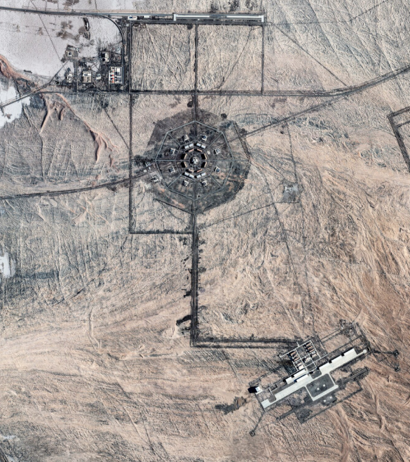 Unveiled_ChinaX's tweet photo. Beijing is carving a terrifying nuclear fortress into the remote desert, bracing for the unthinkable: a direct nuclear showdown with the United States. Newly uncovered satellite imagery reveals a massive, previously unreported military network expanding across thousands of square kilometers near China's Hami nuclear silo fields. This sprawling grid is explicitly engineered to ensure that even if the US launches a pre-emptive first strike, Beijing will maintain the absolute capability to strike back and obliterate American cities.

The sheer scale of this secret desert network has startled seasoned weapons analysts who admit they have never seen anything quite like it. Satellite images show over 80 new concrete launch pads built deep within rocky desert outcrops to field mobile nuclear missile launchers, air-defense batteries, and electronic warfare nodes. At the center of this network are three massive, multi-layered octagonal complexes serving as command-and-control centers, armored bunkers, and rail-linked supply hubs. Further south, a third octagon site near the Lop Nur nuclear test area has already been turned into a pock-marked target range featuring mock-ups of Western fighter jets.

While the US and Russia rely on the sheer isolation and hardened construction of their silos, China is building an active defensive web unlike anything the world has ever seen. 

#UnveiledChina #NuclearBuildUp #PLA #USChinaTensions #NationalSecurity #Geopolitics #SatelliteImagery