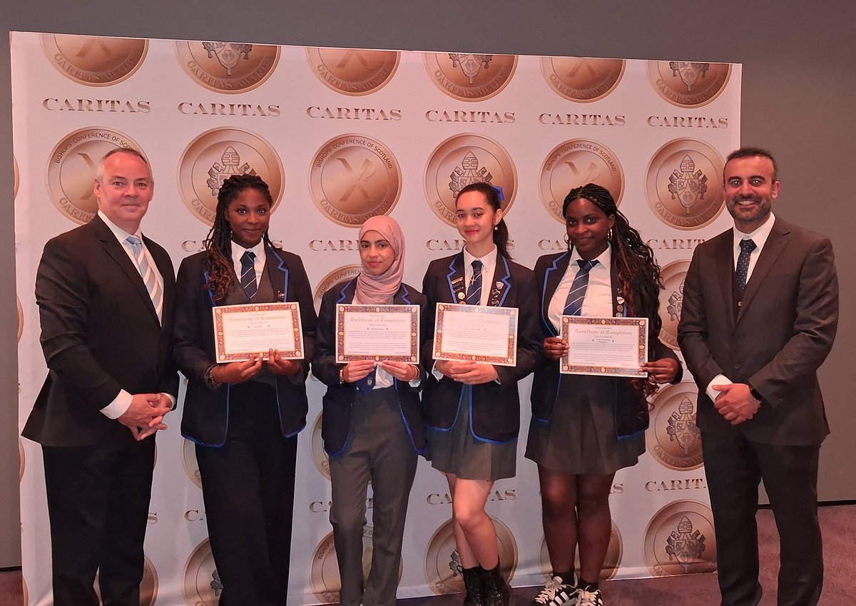 IRDcommittee's tweet photo. Delighted to join with Dr. Ahmed Khweir in presenting certificates to the pupils of Holyrood Secondary for their work in interreligious dialogue. https://t.co/HVi0X60LmV