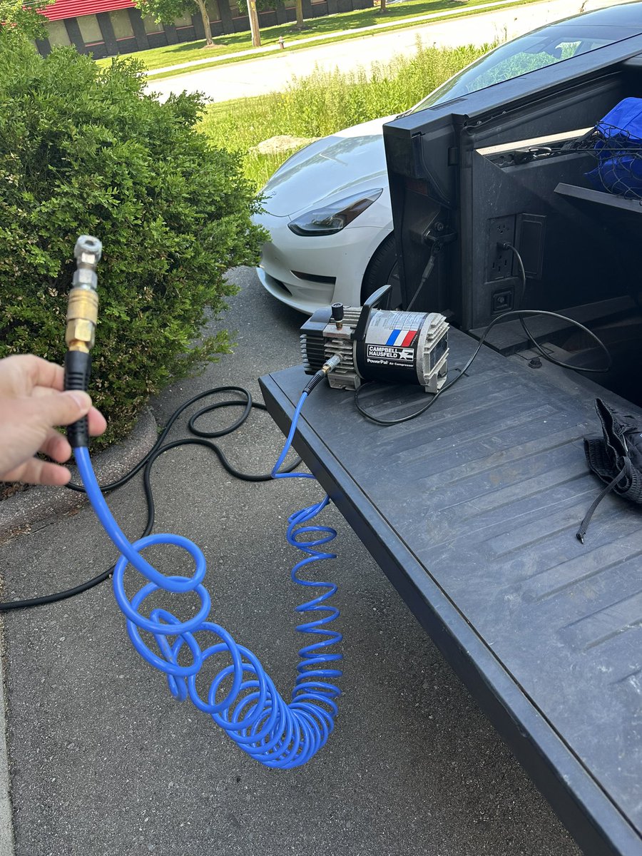 Yev_K's tweet photo. Being able to top up your tires with air compressor that you plug in to your outlets in cybertruck is super convenient. Long hose lets you reach it all around the truck or nearby vehicles https://t.co/hMSpyjjLYI