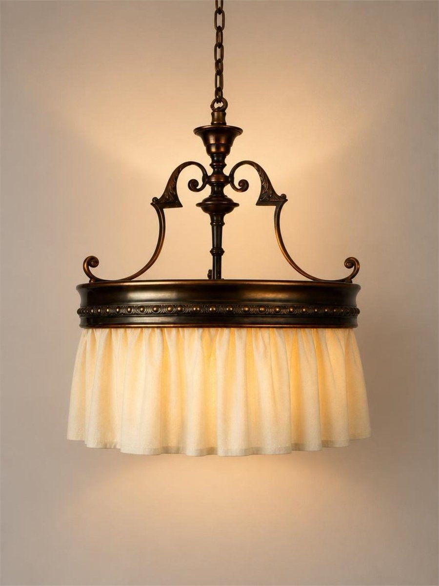 DCwebsite's tweet photo. Such an elegant light from DC seller Ashby Lighting. 

An original art nouveau ring pendant light displays classic early  20th century detail. The copper ring retains its original antiqued  patina with burnished detail highlighting the pattern. Centre stem is  fitted with elaborate scrolls.

A ruffled skirt of natural calico fits within the ring and provides  the perfect shade for this stunning light fixture. Skirt is a bespoke  item, hand stitched to a removable ring.

Size -Overall height 50cm. Width – 43cm Weight 2.6kg

Shop here https://t.co/DqK7wRjvmX