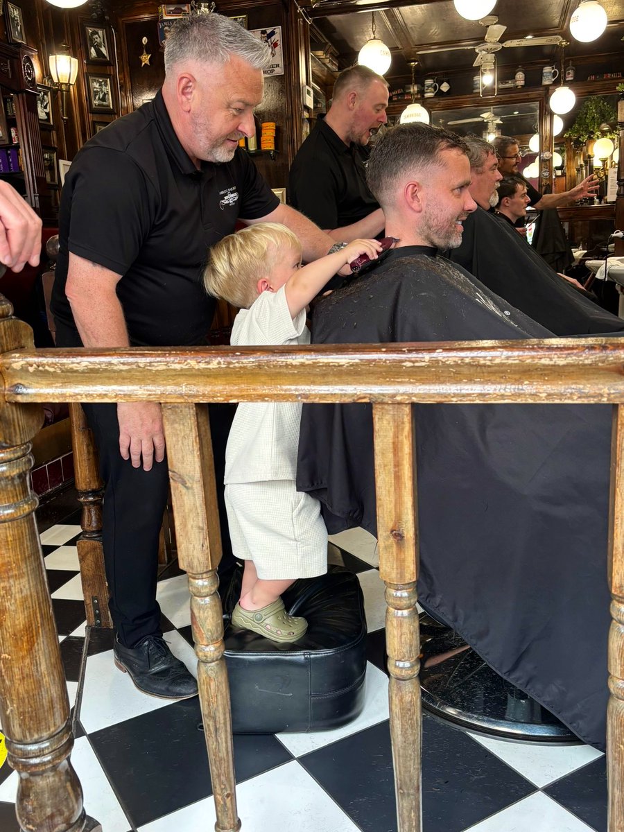 PBY88's tweet photo. From my grandad taking me to Sean… to me taking Marco. Full circle moments 💙. Still the best barber in town @cambridgebarber ✂️ https://t.co/89emRdpzFX