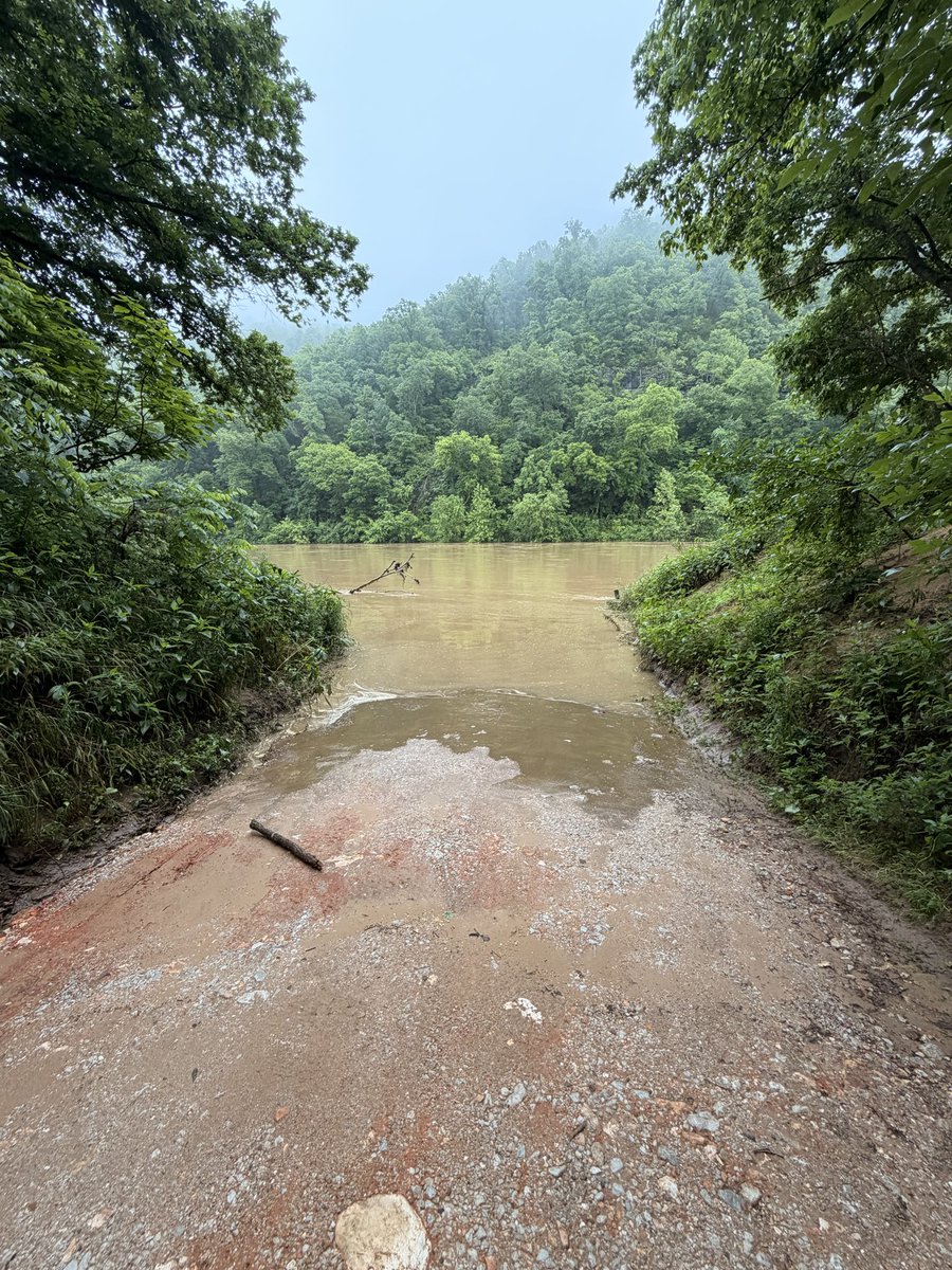 _AdamBurris's tweet photo. It’s a new river today. Access at Gilbert is blown out. More rain expected. Stay safe. #Buffalo https://t.co/vaRjUxHfFm