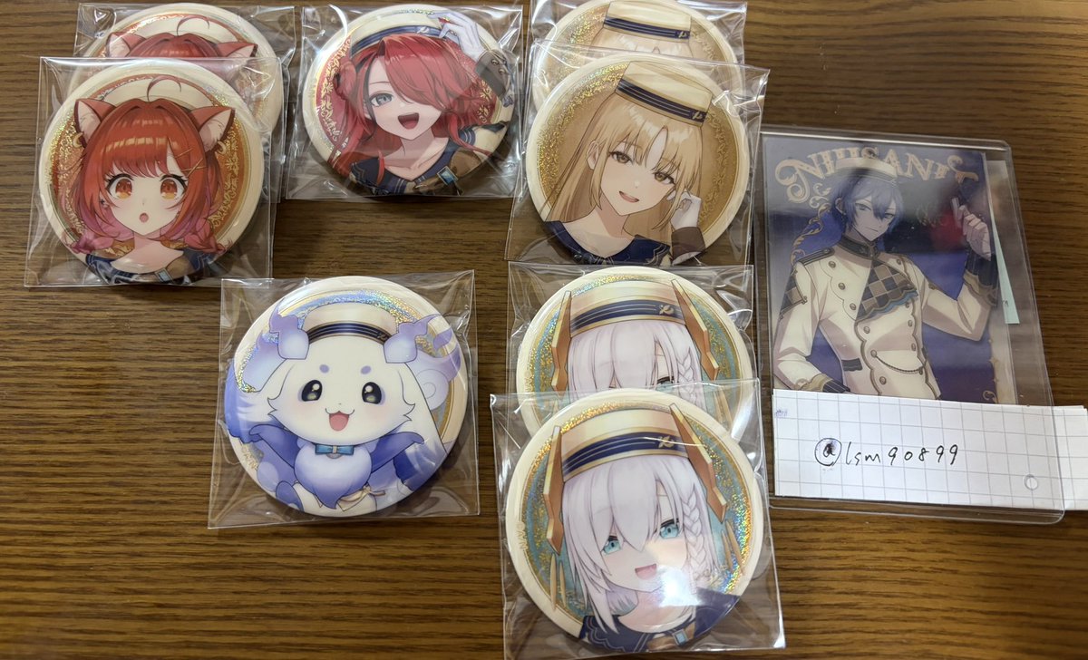 Ism90899's tweet photo. 【交換 譲渡】
にじさんじ にじさんじビスケット 2缶バッジ

譲)画像1,2

求)IDの方>>200円/個＋送料

郵送or都内手渡し

取引は鍵垢にて

検索からでも気軽にお声がけください！ https://t.co/XpjzsFNshx