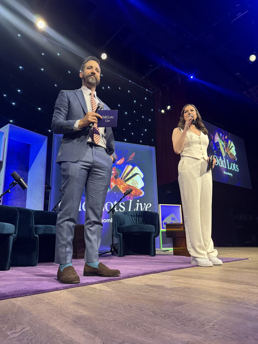 TomasIsMe's tweet photo. Who wore it better?? 

But seriously, great time at live (!!) Odd Lots last night with @TheStalwart and @tracyalloway https://t.co/jAbgwYuCng