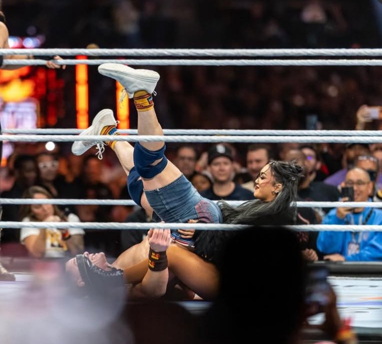 roxanne_wwe's tweet photo. It was only fitting that the prodigy would be the one to retire him. Thank you for your service @JohnCena 🤝🏼 https://t.co/3OG06K3aR1