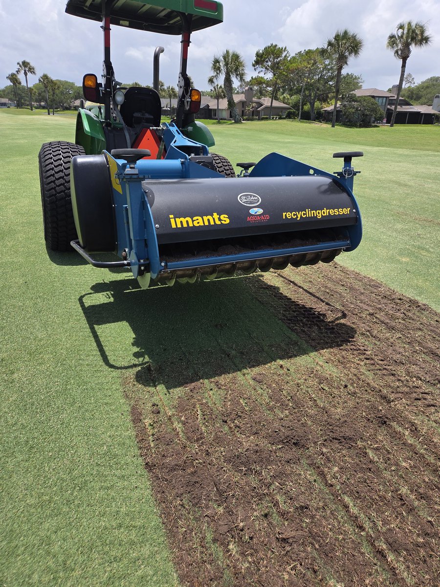 StJohnsTurfcare's tweet photo. The @ImantsBV Recycling Dresser out doing its thing this week. Nothing out there that beats it decompacting, vertical cutting and top dressing in one pass. Contact us to see for yourself! https://t.co/vzNL6q1w3S