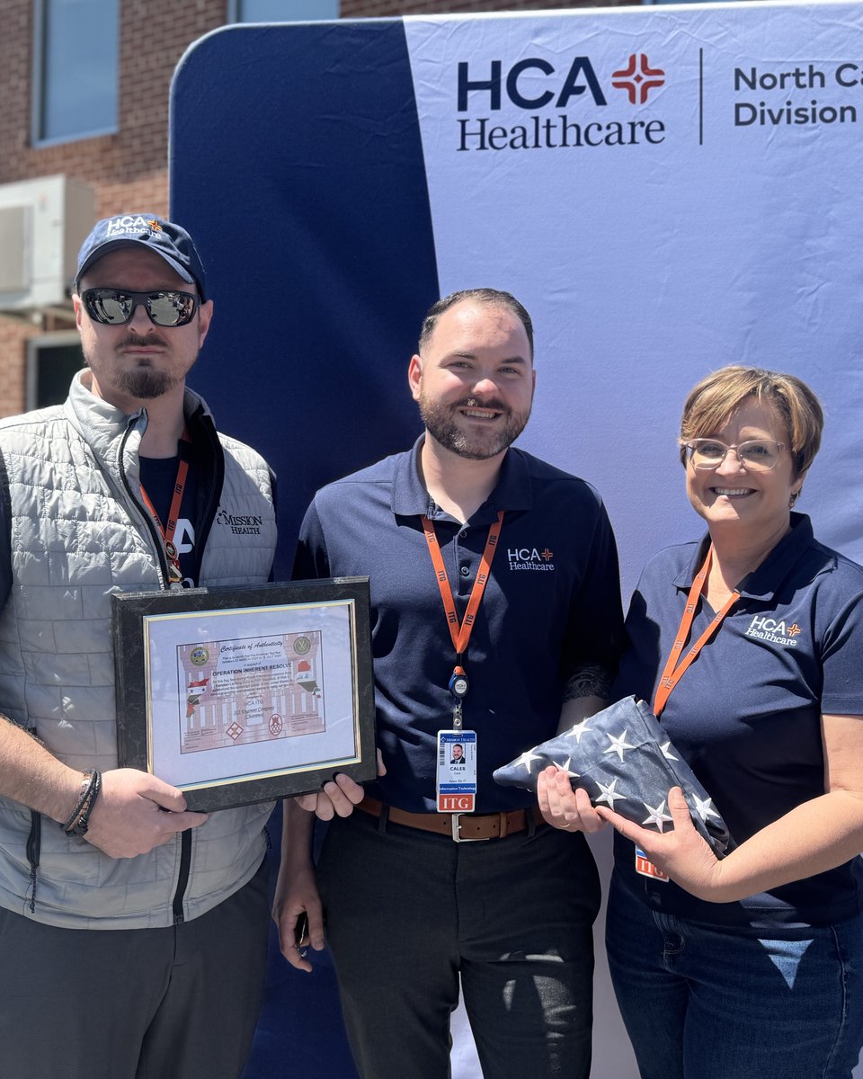 HCAhealthcare's tweet photo. A flag gifted by HCA Healthcare colleagues in North Carolina to a deployed military unit has returned home. For Caleb Stoudt, associate IT director at Mission Hospital, it became a meaningful symbol of support throughout his deployment. #MilitaryAppreciationMonth https://t.co/whehFQffm0