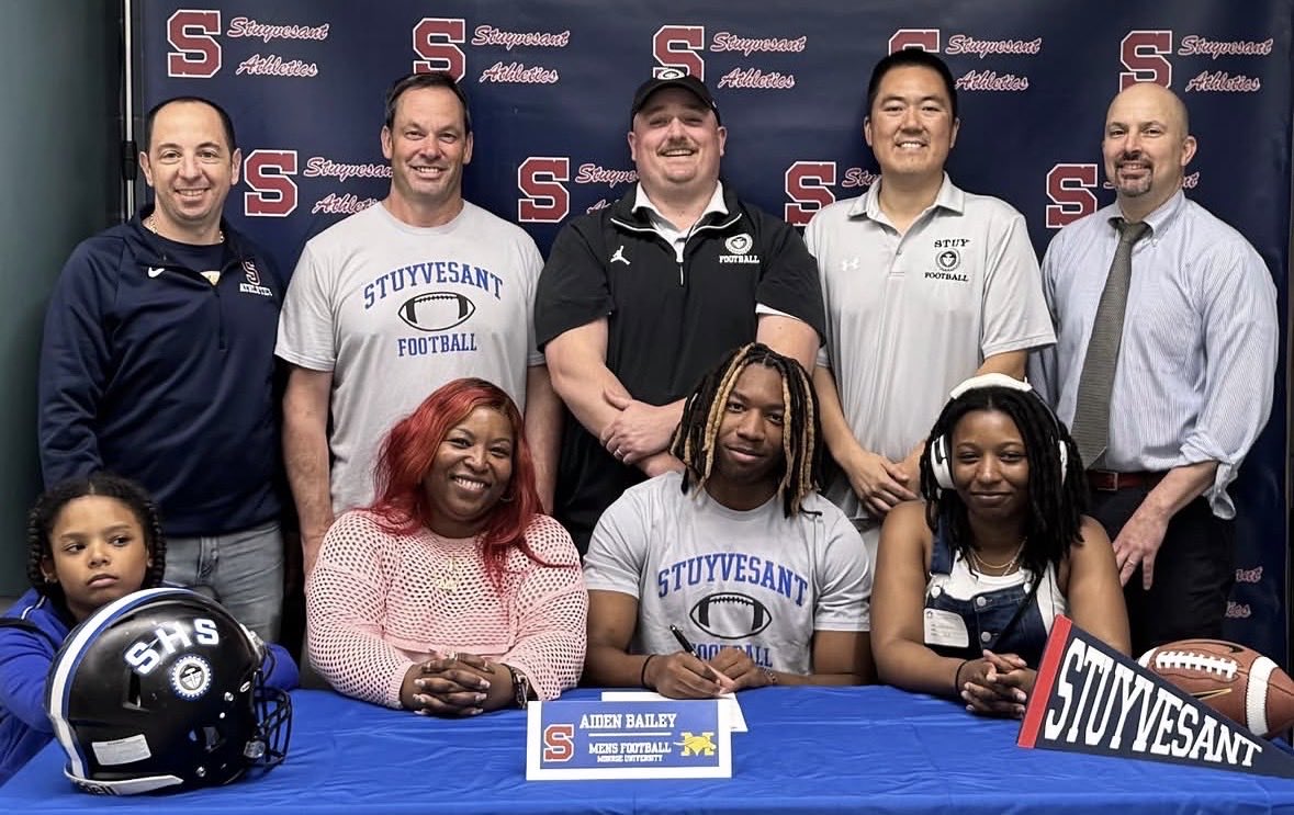 CoachCamSimerau's tweet photo. Signing Day for our guy @Aiden_BaileyRB ! A special moment for him, his family, and our coaching staff! A 4 year player who has paved the way for our underclassmen, showing them what is possible as a student-athlete in our football program! Beyond excited for him to continue his academic and athletic career at Monroe University! There will be a lot of Stuyvesant supporters at @mjcmustangs home games this fall!