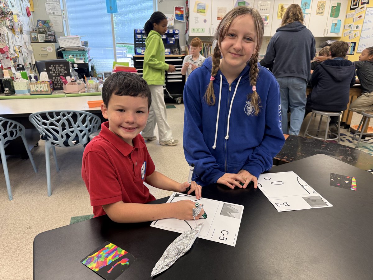 L_Pawelkowski's tweet photo. Part 2: 2nd graders visited their 6th grade pen pals at the Ravenna campus 💚💙 #OurBMSA https://t.co/eigmsn3NEX