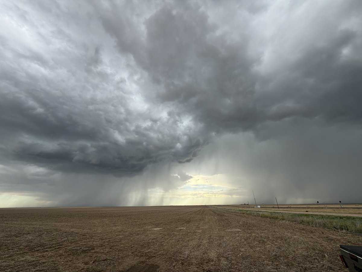MyRadarWX's tweet photo. Today, newly-graduated meteorologist  @willcanowx chased cells across the barren terrain of western Kansas and eastern Colorado. 

The most impressive part? Perhaps the mighty rain shafts dancing across expansive dirt fields. Or maybe the creamsicle sunset fused with a purple lightning show to the east. 

Success in storm chasing is not solely defined by catching a tornado. It’s measured through many different modes — occasionally, by straight simplicity.