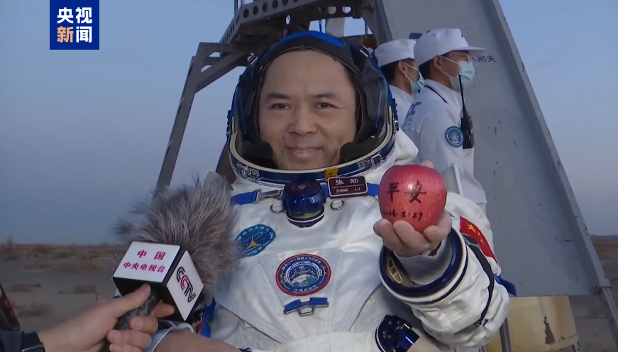 CGTNOfficial's tweet photo. On Friday evening, the return capsule of the Shenzhou-22 crewed spaceship landed safely at the Dongfeng site in Inner Mongolia. Among the three astronauts of the Shenzhou-21 mission returning to Earth, commander Zhang Lu brought back a special gift from the space station: an apple marked with Chinese characters, meaning safe and sound.

He dedicated the apple to all science and technology workers across the country, in celebration of National Science and Technology Workers' Day on May 30. #SpaceChina