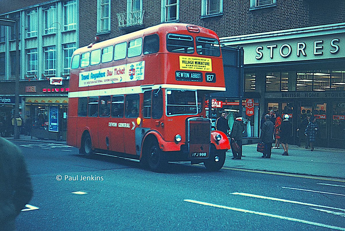 devongeneralso1's tweet photo. A 1976 view of Weymann-bodied Leyland Titan VFJ 998 at Fore St in Exeter. It's arriving from Newton Abbot as a Ser 186, having entered the city via Alphington, &amp;  its blind is already set for the return journey as a Ser 187, leaving via Countess Wear.
Picture credit: Paul Jenkins https://t.co/UYtCjXgwKT