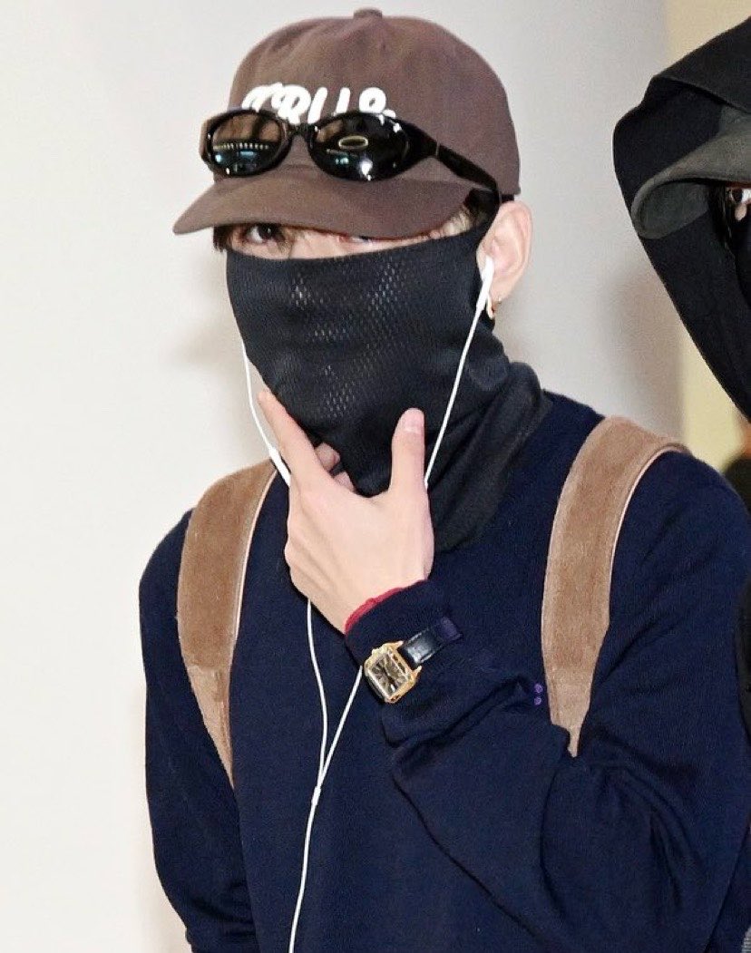 revesbleus's tweet photo. celine sweater, cartier watch, carven glasses resting on top of the cap… his  airport styling is always so effortlessly cool https://t.co/zyVBg7PBvm
