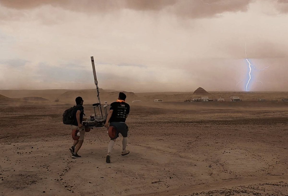 TheMarsSociety's tweet photo. Friday wasn't without its chaos, though, as a massive storm came in fast at the end of the day. Everybody is safe, fortunately. URC missions did end early & a few teams will make up those events on Saturday. #URC2026 #MDRS #robotics #students https://t.co/wDZWdnyy1P