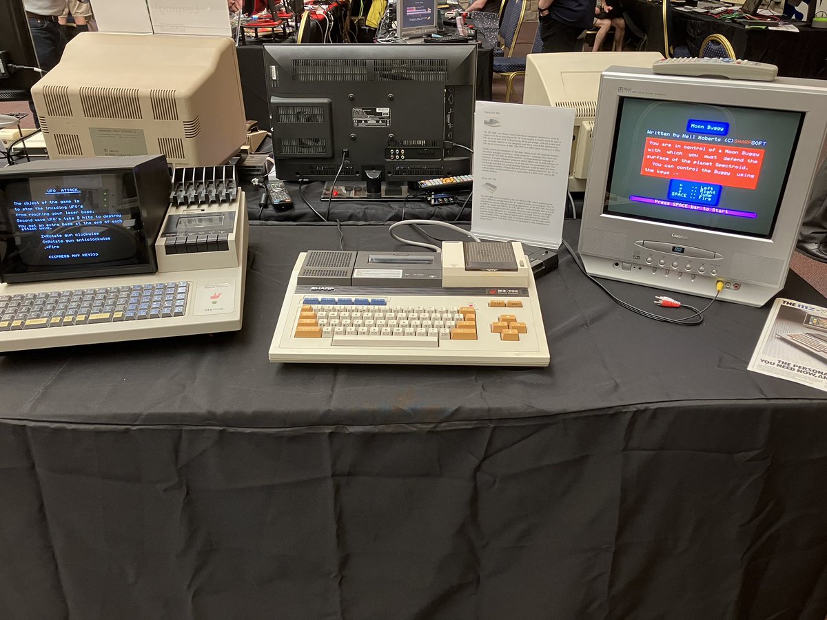 SharpworksMZ's tweet photo. All set up with my MZ-80K and MZ-700 at this year’s Retro Fest https://t.co/NdbmZtWyEt