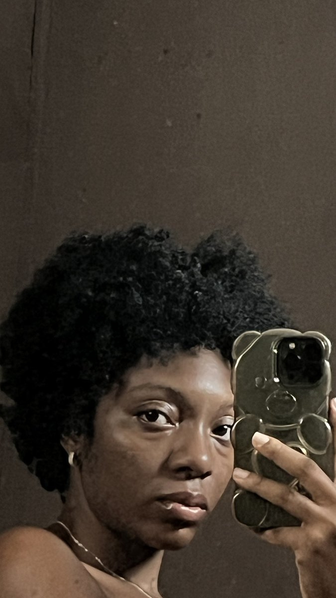 LaudableJulia's tweet photo. About to take this hair down and decided to take photos for the record. 

I truly believe I look beautiful in an afro. One of my goals this year is to heal my afro; sadly, I haven’t really started out with that 😪. I wish my mom never permed my hair with relaxers, but I can understand that she probably didn’t know better. Every mother was perming their daughters’ hair around us. 

I use to be a child with such full afro. So full that I remember most salons my mother took me to, the hairdressers always said “madam this your pikin hair full o” 😅. 

Lately I’ve been leaning towards hair styles that accentuates the features of a black woman. There’s something about wearing my hair this way that feels familiar, like I’m reconnecting with a part of myself that has always been there.

Anyway, here’s my face card, May 30, 2026 😁