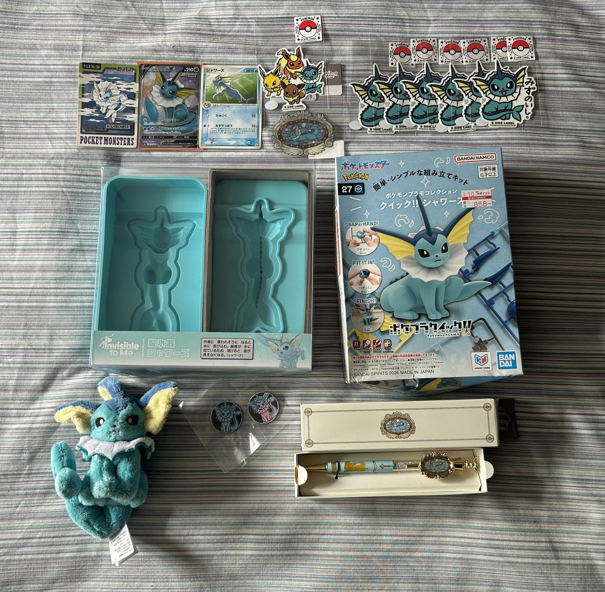 VaporeonSpotted's tweet photo. I got back from Japan yesterday. Here’s all the Vaporeon stuff I bought https://t.co/51QYMdXkTy