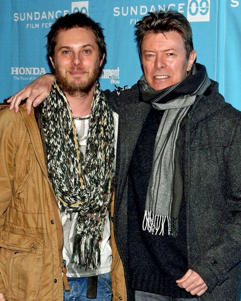 DavidBowieReal's tweet photo. HAPPY 55th TO DUNCAN JONES

“'Cause we believe in you...”

Happy fifty fifth birthday wishes to David’s son, film director Duncan Jones, who was born on 30th May, 1971.

The images of the two years and eight months old Zowie Bowie were taken by Roger Bamber at the Amstel Hotel in Amsterdam in February 1974.

The final image is of Duncan and proud father at the premiere of Moon during the Sundance Film Festival in Park City, Utah, in January 2009.

Following the viewing, David had this to say: “It’s such a great movie. It’s hard to believe it’s his first. I’m so happy for him and proud as punch.”

Hope you have a great day, Duncan. Lots of love from everybody here at DBHQ.

Meanwhile, find out all you need to know about Duncan’s latest exciting project, due very soon, here: https://t.co/re6skKQBQJ

#DuncanJones55 #DavidAndDuncan #DuncanJones #RogueTrooper2026