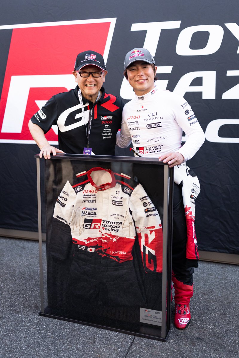 Taka and Aaron present Morizo with a special gift: a signed racesuit ...