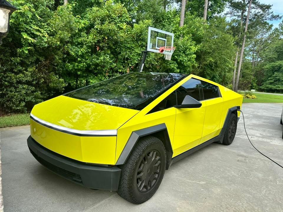 TheTeslaLife's tweet photo. John Evans wraps his #Cybertruck in shocking yellow! #CyberWrap #TeslaWrap https://t.co/EPFgyltXKd