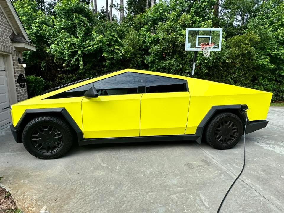 TheTeslaLife's tweet photo. John Evans wraps his #Cybertruck in shocking yellow! #CyberWrap #TeslaWrap https://t.co/EPFgyltXKd