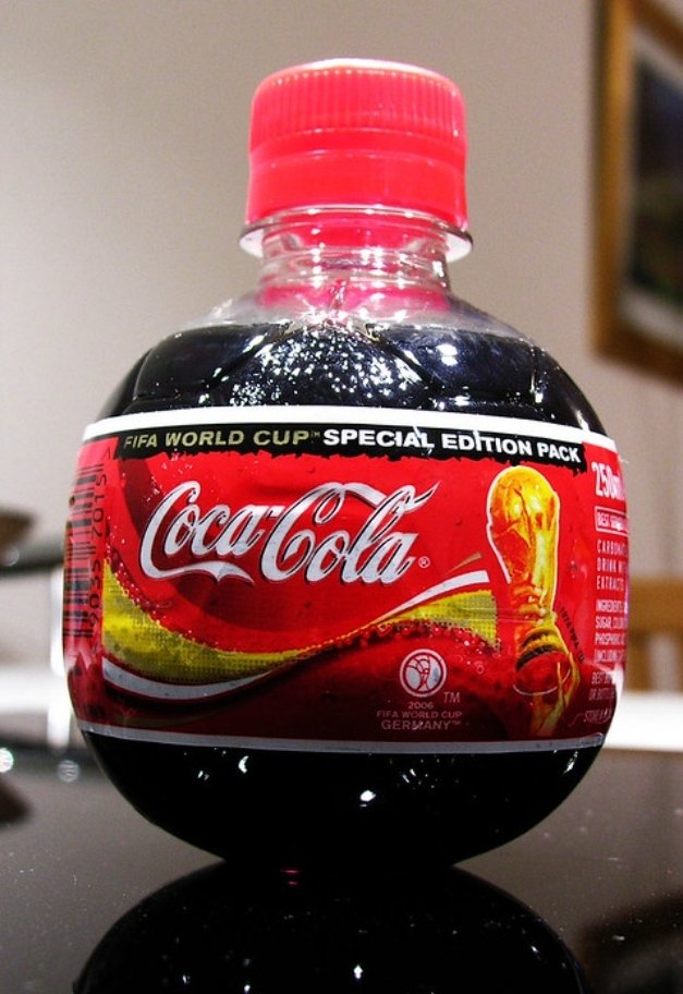 DrakeTheroux's tweet photo. @BrachyZoid Never knew these were a thing back then! The only time I remember seeing an orb shaped coke bottle was at Galaxy's Edge, but it looks like they did ones for FIFA, Baseball, Christmas, and maybe even more. https://t.co/PVucxsi4MD