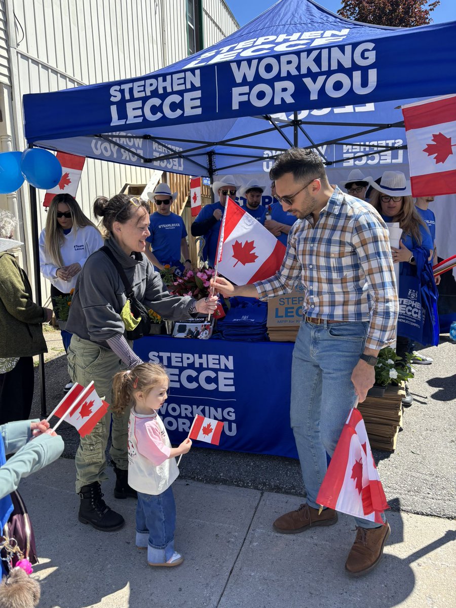 Sflecce's tweet photo. That was a first for me — riding down Main Street in a tractor.

Great tradition and patriotism at the 176th Schomberg Agricultural Fair, as #TeamLecce handed out Canadian flags — celebrating our rural community and the best country. https://t.co/53HPsRhCIy