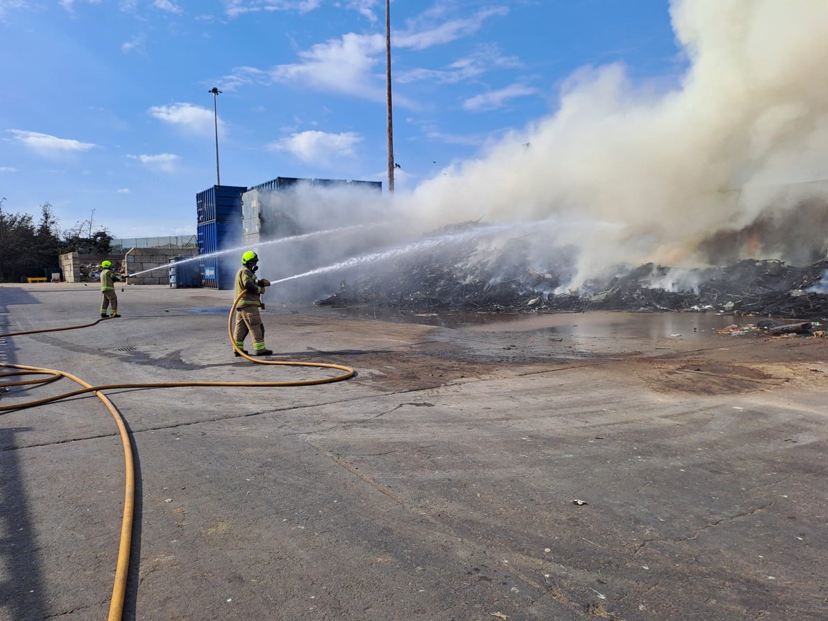 LondonFire's tweet photo. Crews are working to extinguish a fire involving a pile of waste at a facility on Transport Avenue, Brentford. 

People in the immediate area are advised to keep doors and windows closed where possible, due to the smoke being produced. 

More info https://t.co/uET0kcaTpP https://t.co/0wTsYCHPCW