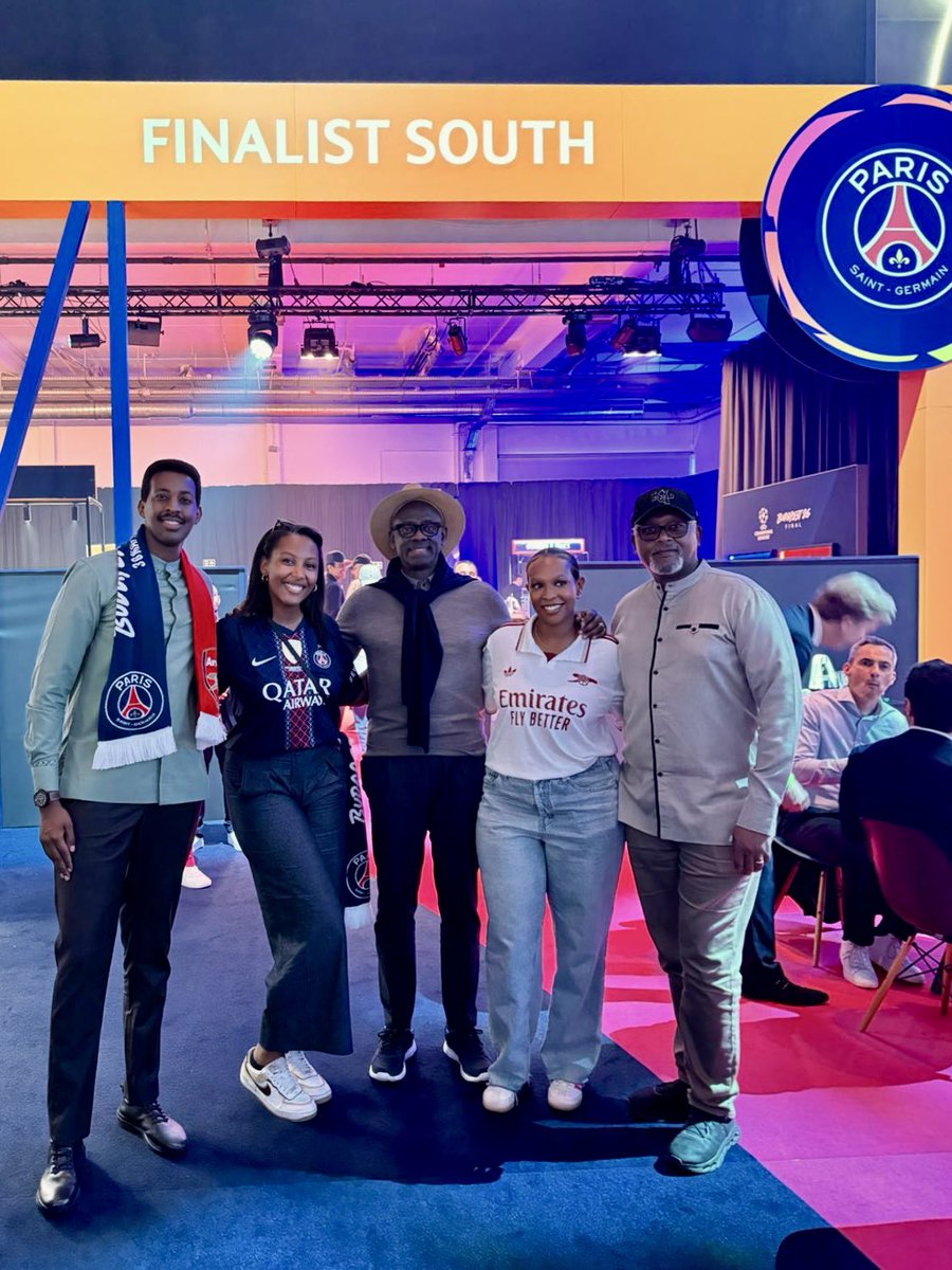 RwandainFrance's tweet photo. What a night to be Rwandan ✨

Both finalists wear #VisitRwanda on their sleeves tonight 🏆 and Team 🇷🇼 is out in force at the Puskás Aréna, backing both our partners @PSG_English and @Arsenal!

Good luck to both and let the best team win! ⚽

@NgarambeRwego 
@FNimfura 
@BusingyeJohns 
@MaevaSKH 

#UCLFinal #Budapest26 #VisitRwanda