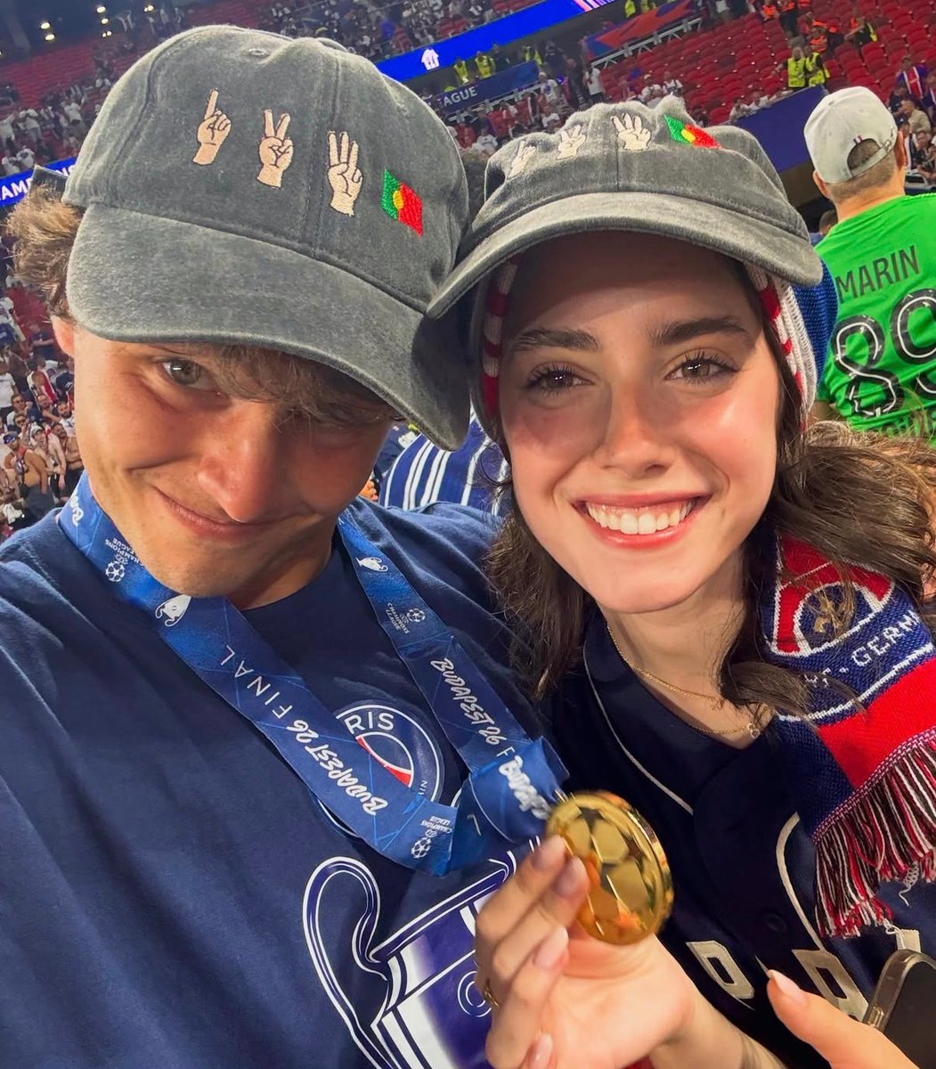 TouchlineX's tweet photo. Joao Neves celebrates the UCL title with his girlfriend. 🇵🇹🌟 https://t.co/ECrl0RfRdH
