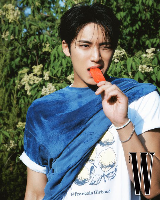 Maingyu's tweet photo. Like I said before, this photoshoot was all about comfort. Be honest, your eyes feel a little more relaxed after seeing all this green or is it because of me? One bite of ice cream later and everything feels even fresher. So, do you think want to take a bite too? https://t.co/17HqgdDLzs
