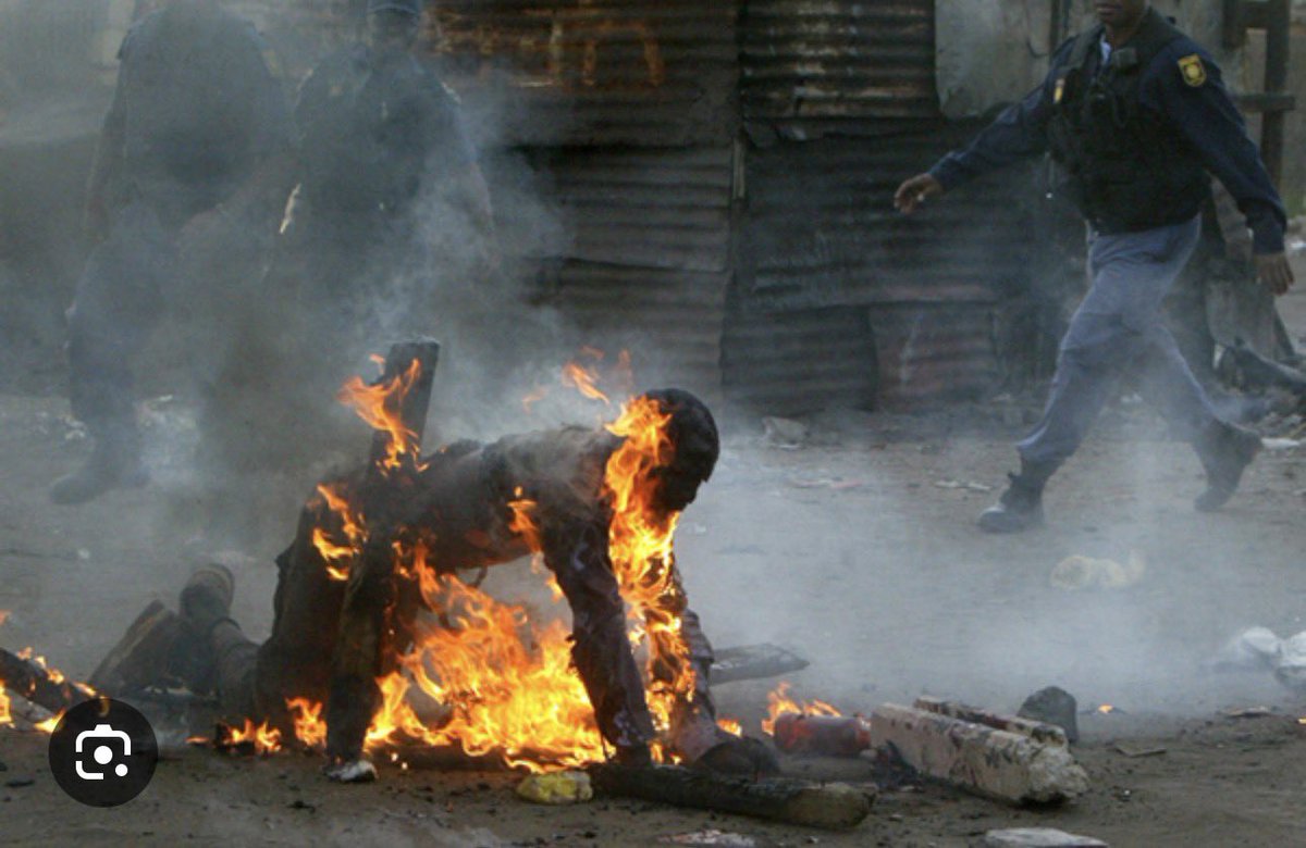 ronbagaga's tweet photo. Why was the South African government so ferocious against Israel after Oct 7, dragging them to The Hague over Hamas... but so unreasonable and silent when it comes to xenophobic mobs burning foreign nationals alive on SA soil? Is the ANC just headed by terrorists in Hamas cloth? https://t.co/uRWvOuDC1f